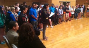 Alpha Pi Omega President Sharon Ross speaks at a moment of silence for Faith Hedgepeth. Seated in the foreground are Faith's parents, Roland and Connie Hedgepeth. (Photo by Andy Willard)