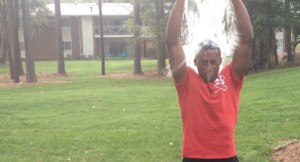 UNC Senior Jerrod Powers soaks himself in the ALS Association Ice Bucket Challenge.   (Photo by Charlie Shelton)