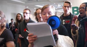 A student protest disrupted the Board of Governors meeting in Charlotte.