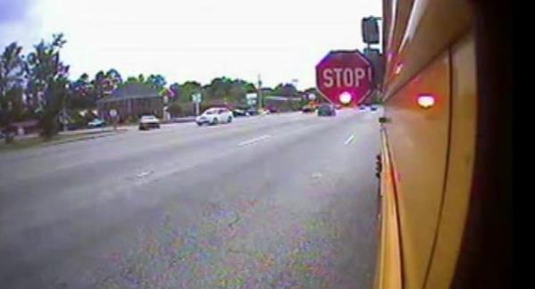 School systems are installing cameras  on the sides of buses to catch motorists who illegally pass them.