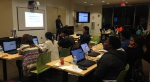 Lile Stephens of the Kramden Institute teaches a computer basics class that is part of a digital literacy program for public housing residents in Chapel Hill. (Photo by Tatiana Quiroga)