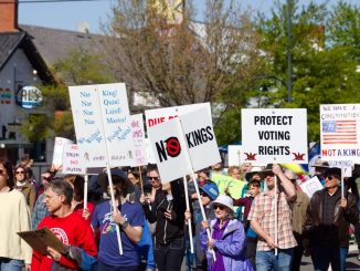 Protesters march at the third national No Kings protest in Chapel Hill. (Gabriel Smith)